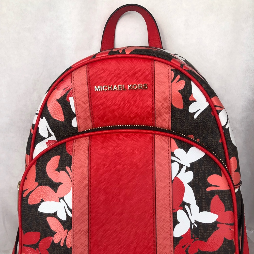 Michael Kors butterfly backpack/ID coin pouch